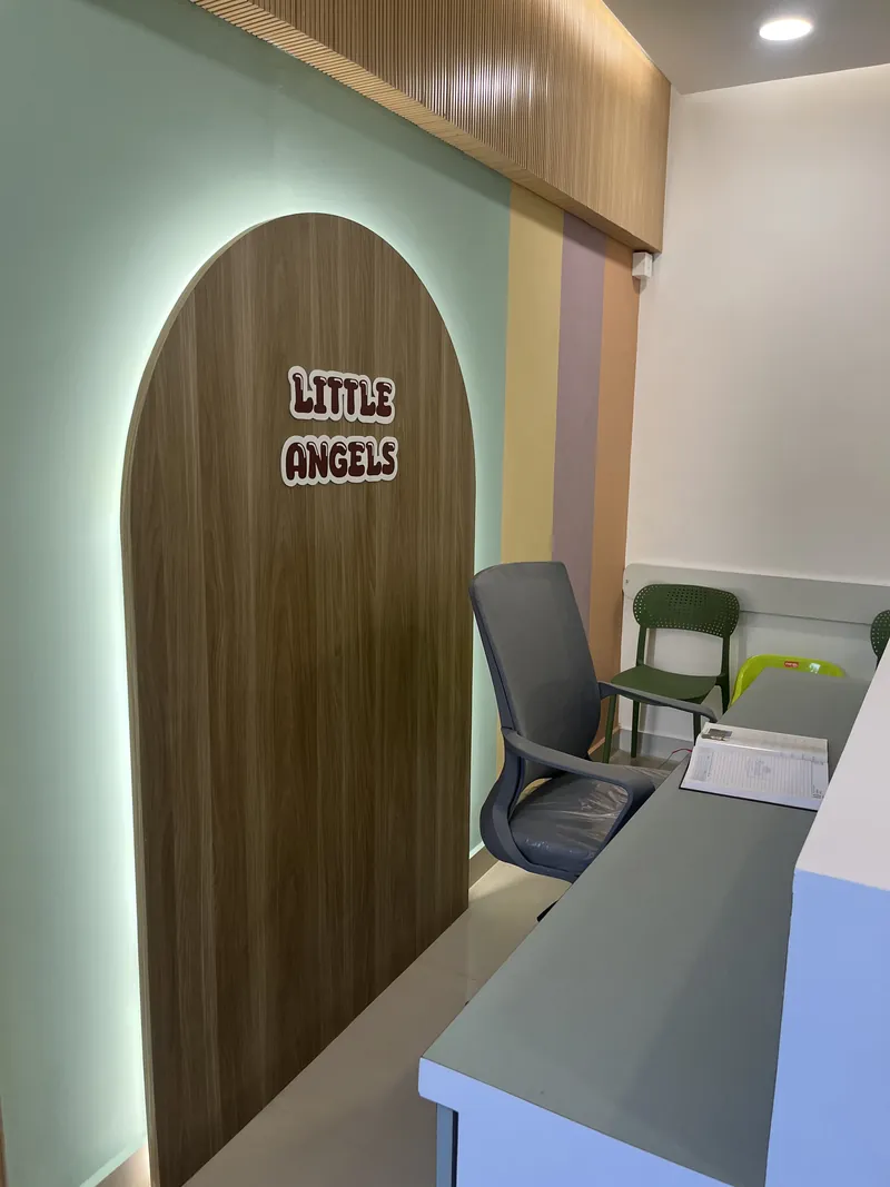 Consulting desk beside the Little Angels arch