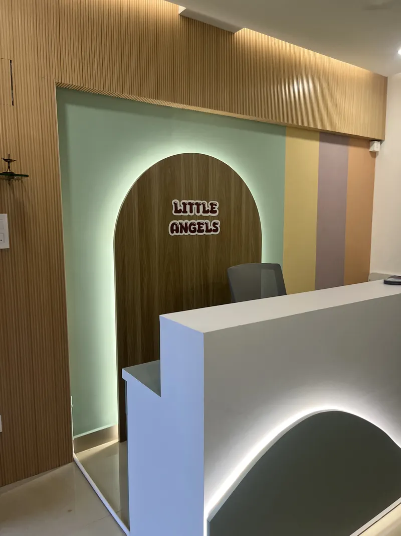 Reception counter beneath the Little Angels arch
