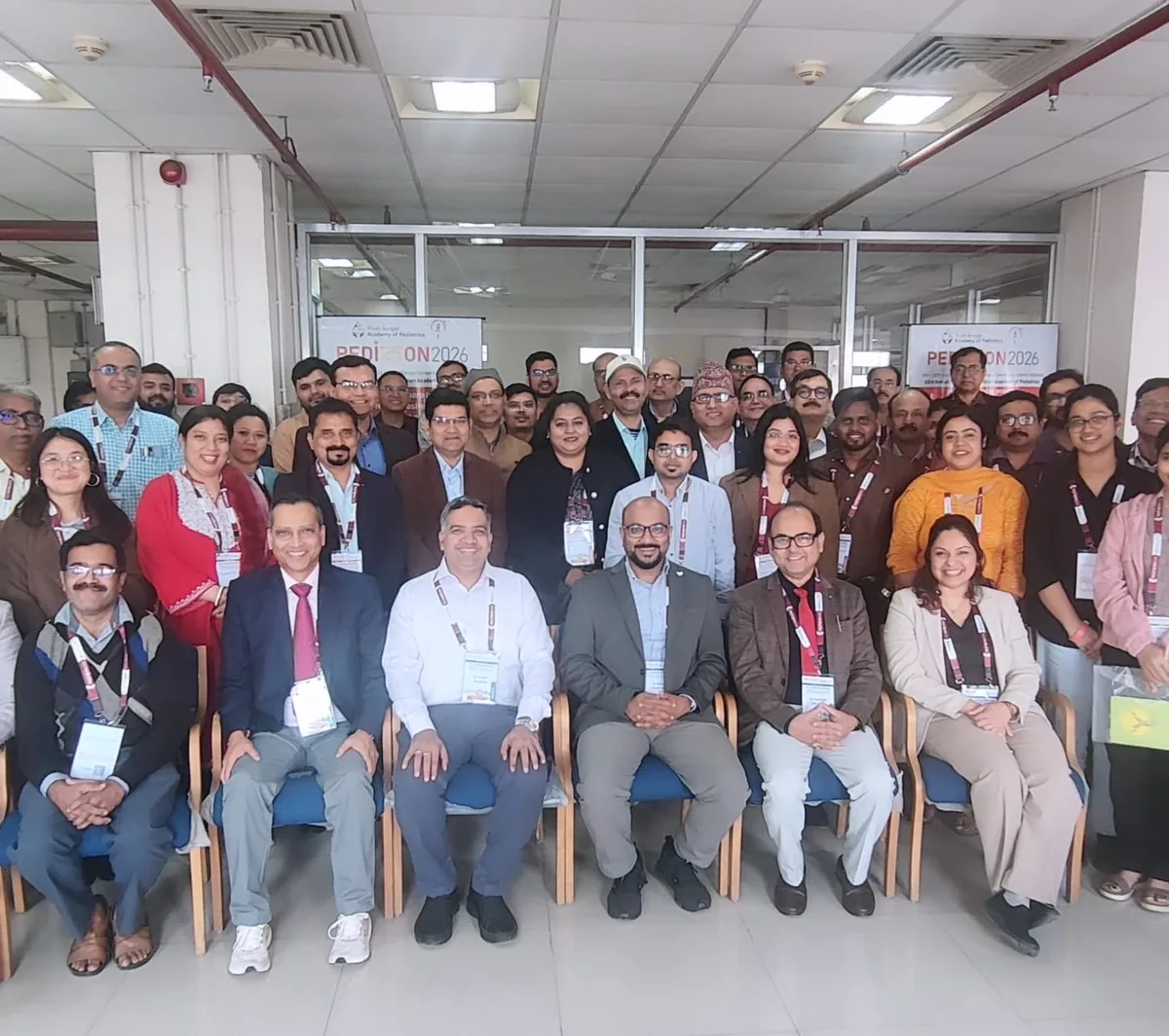 Large faculty and delegate group photograph at Pedicon 2026