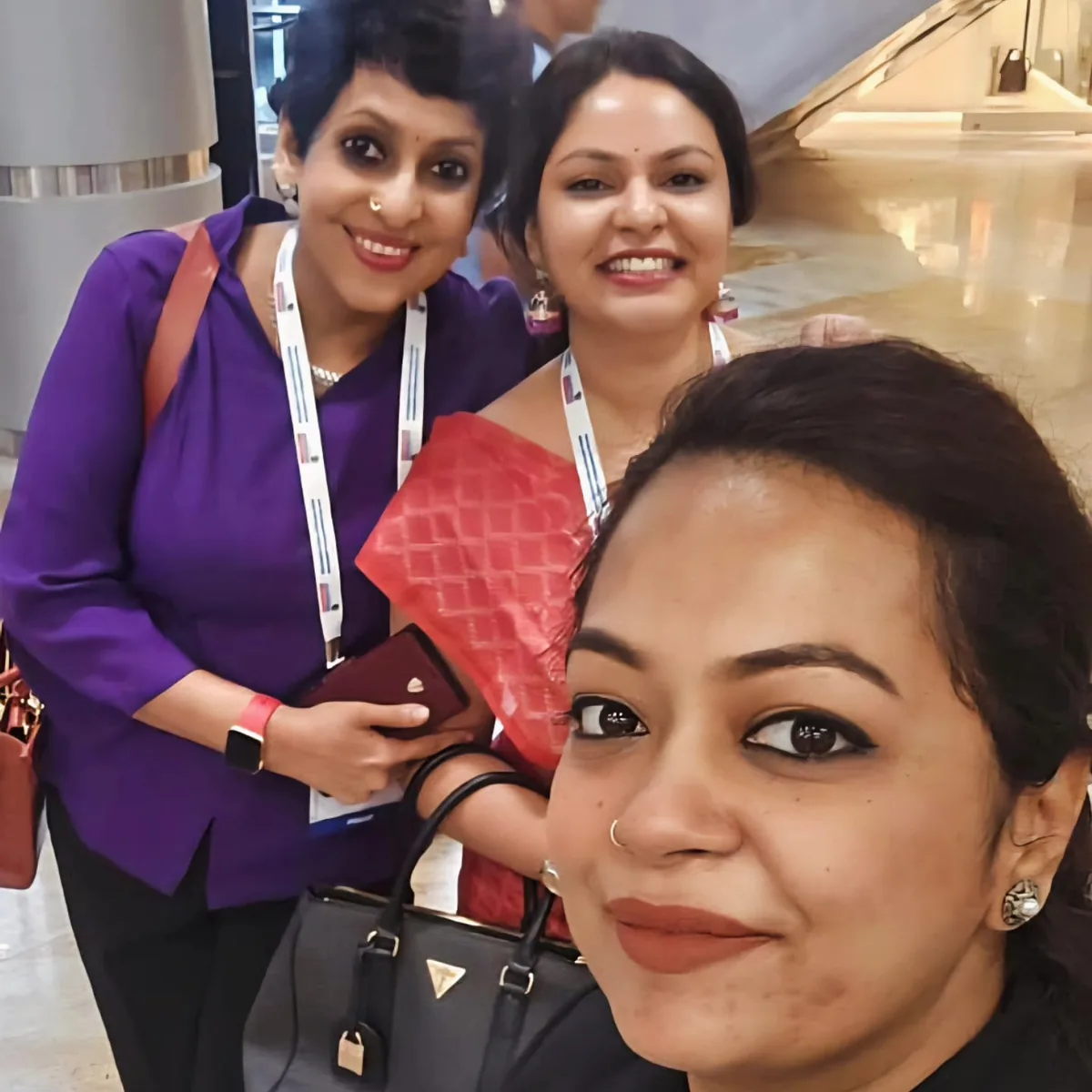 Dr. Swathi Rao with colleagues at a conference venue